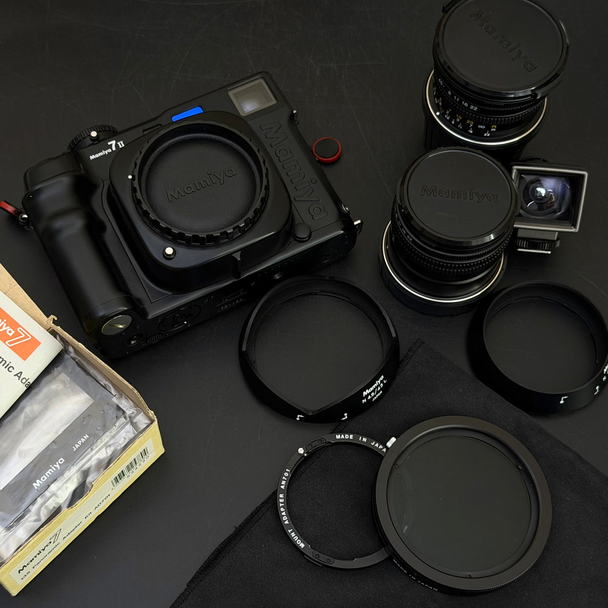 Mamiya 7II + 80/4 + 43/4.5 + Pano Kit + PL Kit Near Mint US$7580