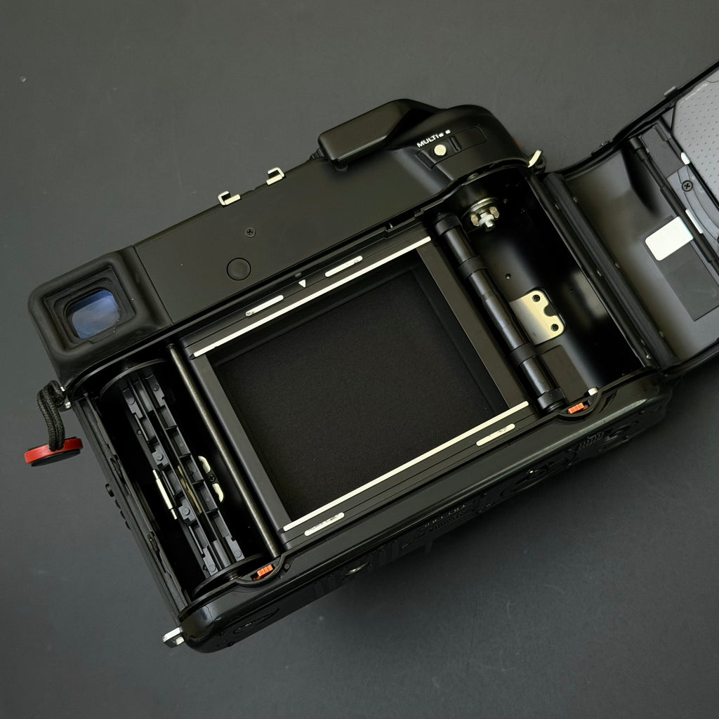 Mamiya 7II + 80/4 + 43/4.5 + Pano Kit + PL Kit Near Mint US$7580
